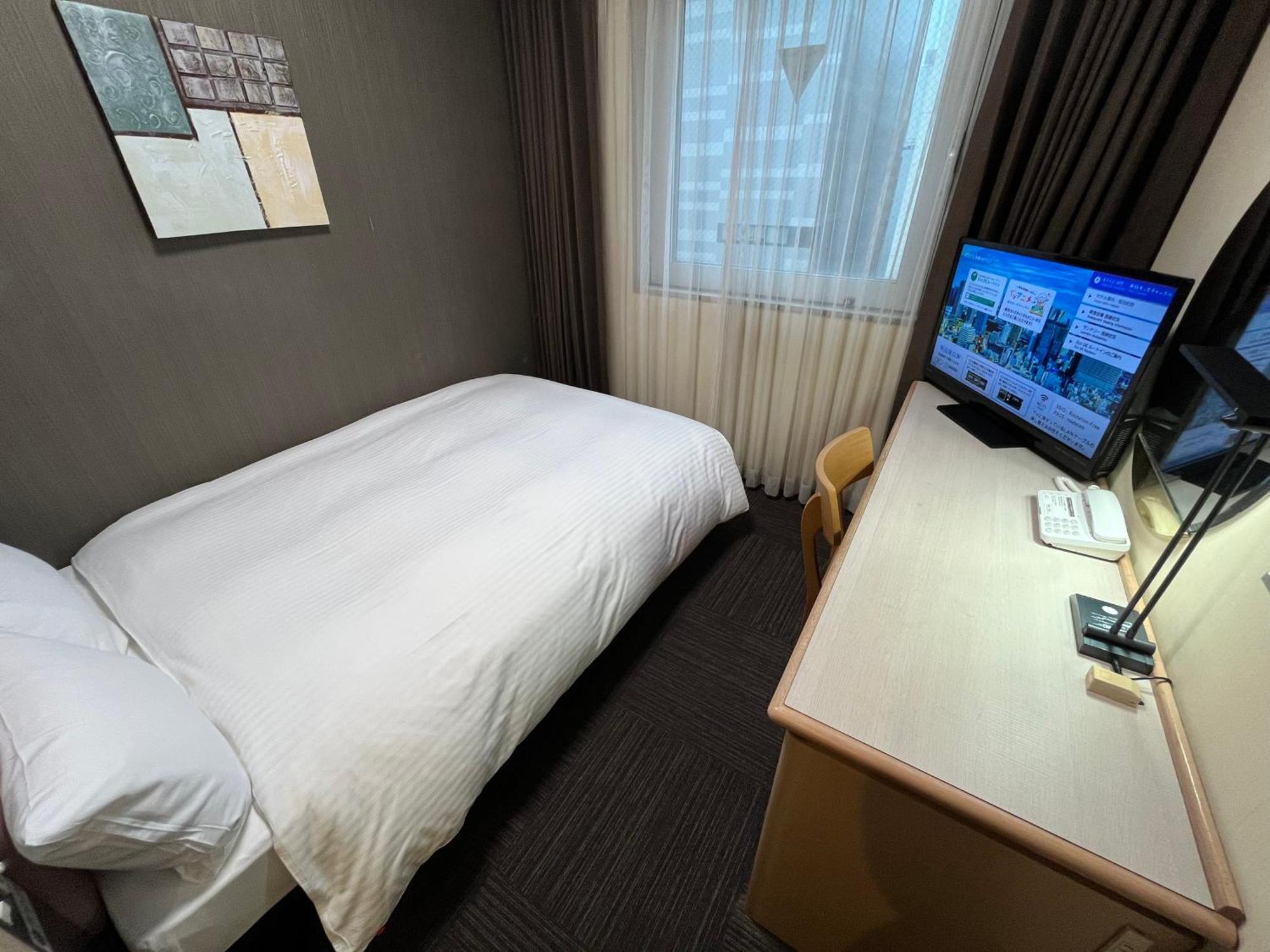 Hotel Route-Inn Tokyo Ikebukuro — Photos 1